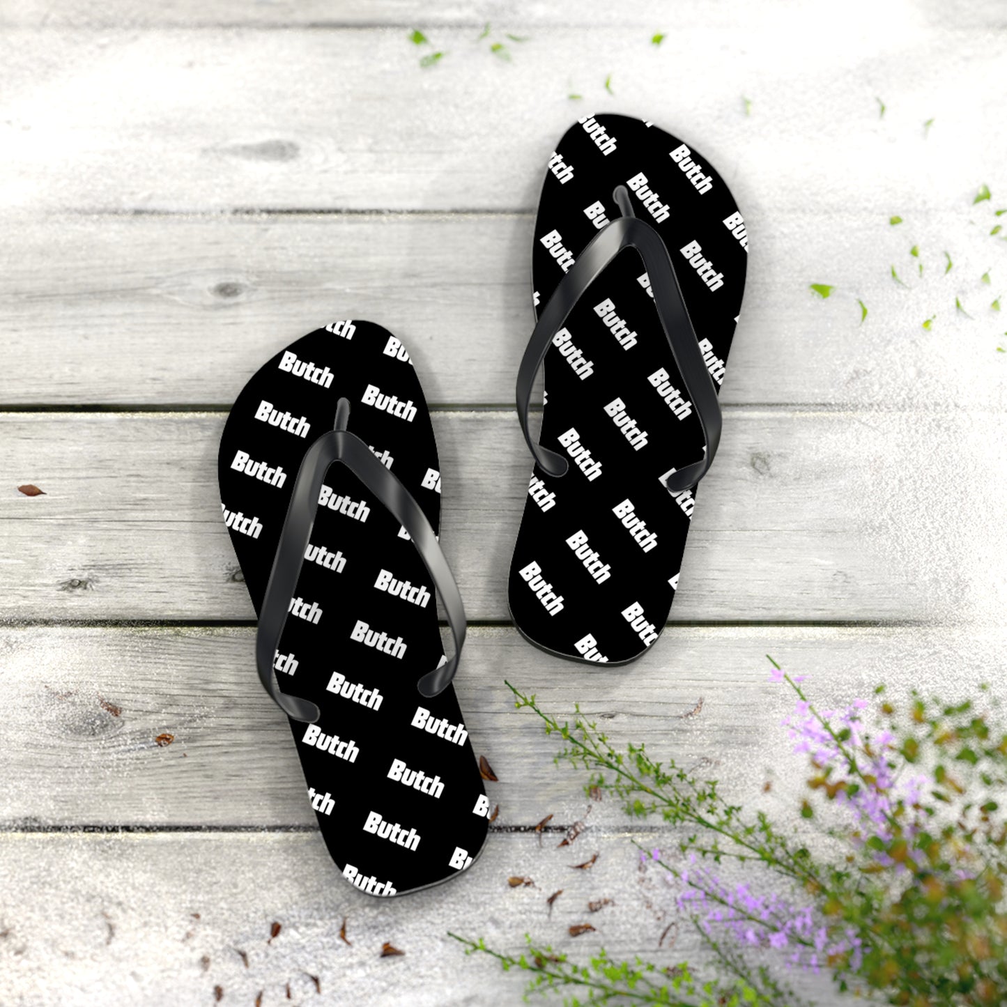 The Black Pattern Flip Flops