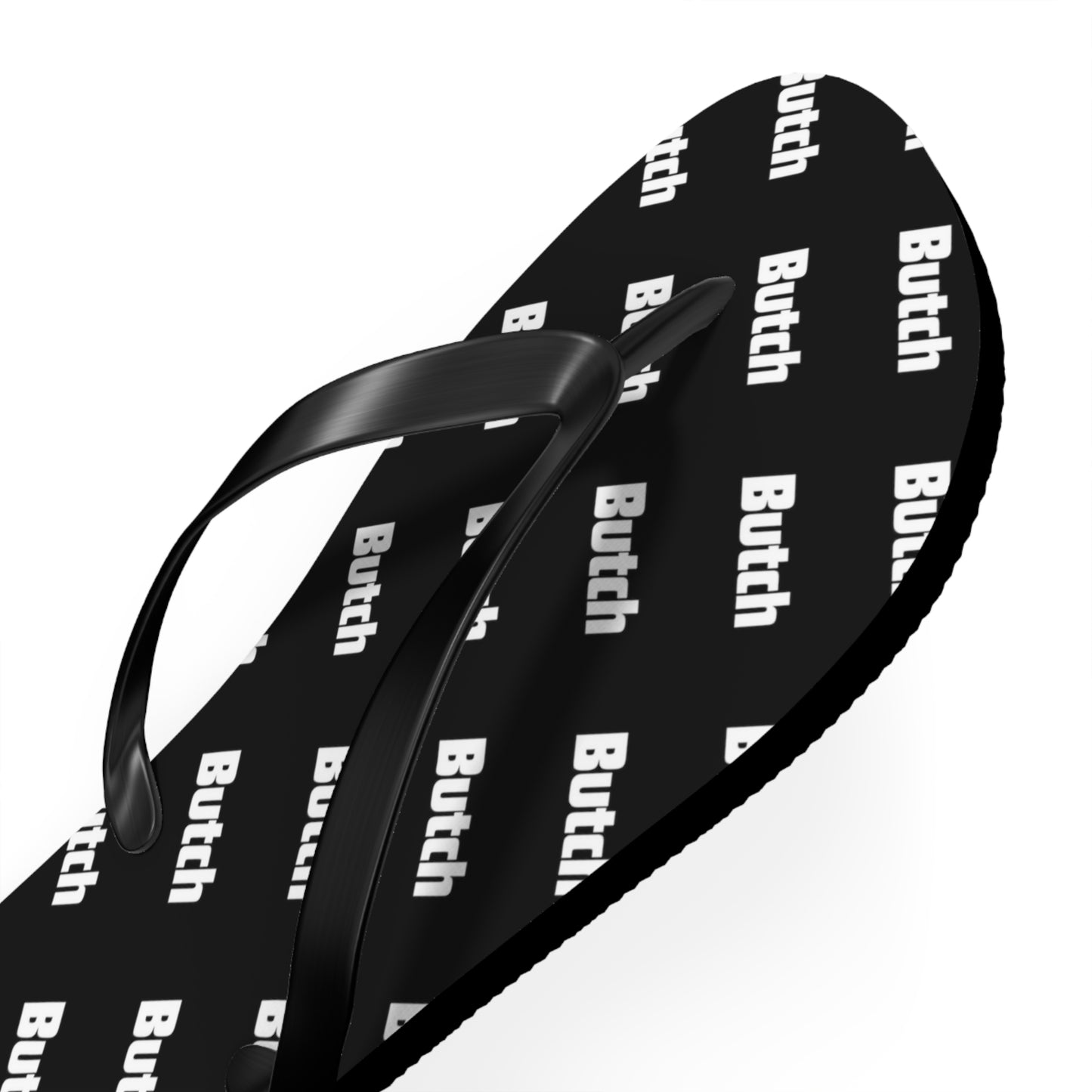 The Black Pattern Flip Flops